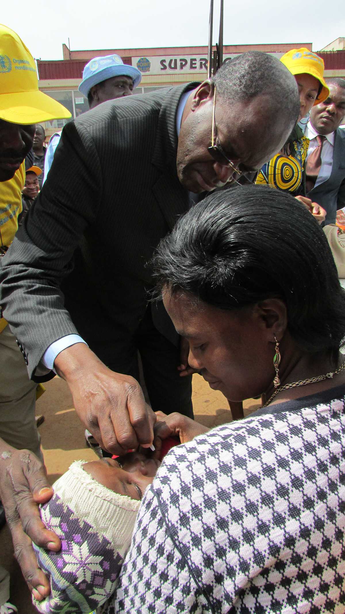 Cameroon: Local leaders play a critical role in creating awareness and mobilizing families to have their children vaccinated. Here local leaders are participating in a polio immunization campaign in Cameroon. 