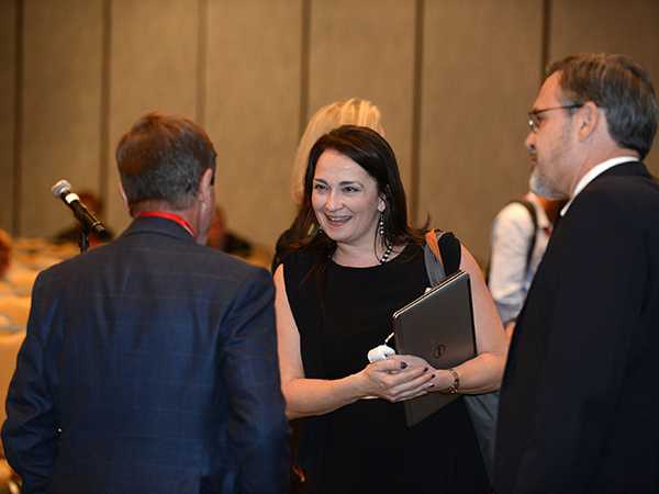 Dr. Shannon Hader, MD, MPH greeting attendees at the Annual Meeting for CDC’s Division of HIV & TB