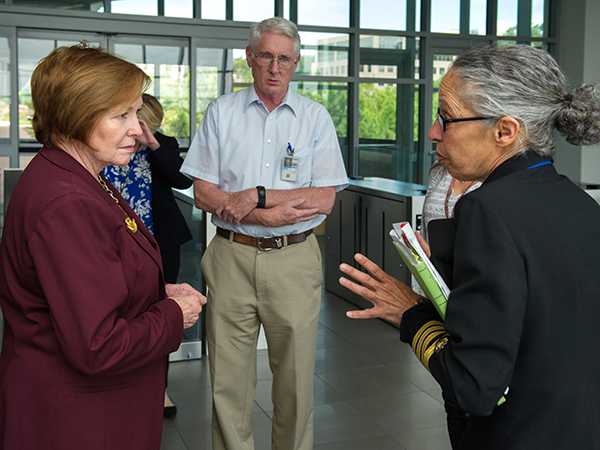 Capt. Monica Parise, MD, Director of the Division of Parasitic Disease and Malaria (DPDM) (right) ushers new CDC Director Dr. Brenda Fitzgerald (left) in to DPDM’s laboratories for a tour with DPDM Entomology Branch Chief, Dr. Bill Hawley (center). 