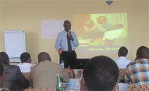 Eugene Zimulinda, DOD-Rwanda, answers questions from Peace Corps volunteers and their local counterparts following a training in March 2011