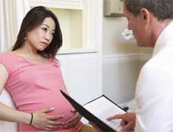 doctor talking with patient