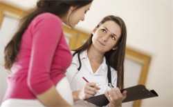 doctor talking with patient