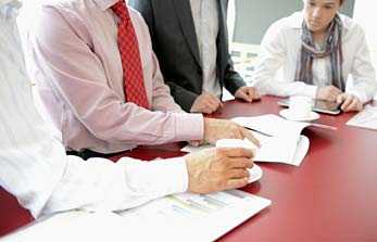 	Group of Business people working on an action plan.