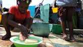 	An Ivorian child washes her hands on the first Global Handwashing Day, which took place in 2008.