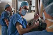 	Photo of surgeons washing their hands in preparation for surgery