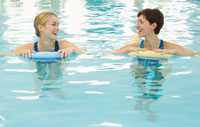 Photo: Two women in a swimming pool