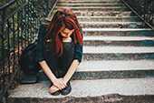 girl sitting on stairs