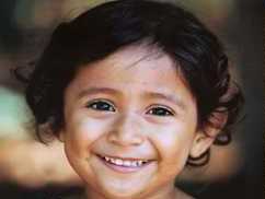 	Photo of smiling young girl