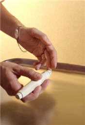 Reusable fingerstick device