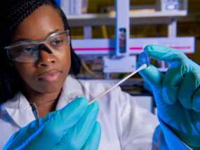 Photo of scientist working in laboratory