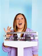 Woman weighing herself on a scale