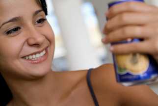 Woman looking at a beverage