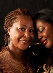 African American Women hugging