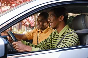 Photo: Father and son in a car