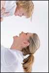 Photo: A woman holds up a toddler