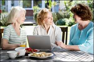 Three older women talking