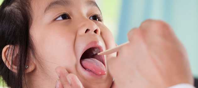 doctor examining girl