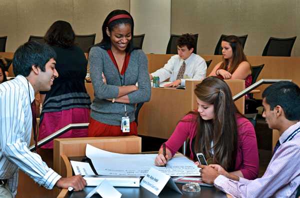 Campers brainstorm about how laws can impact public health.