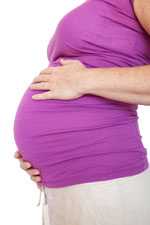 pregnant woman holding stomach