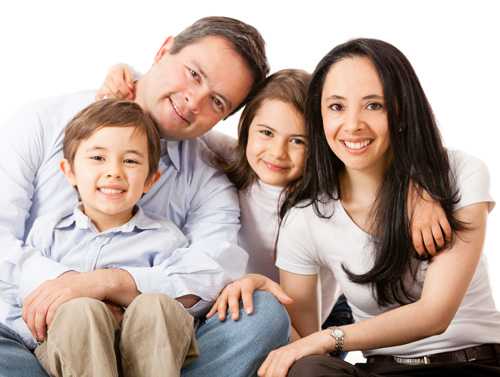 Family of 4 posing for picture