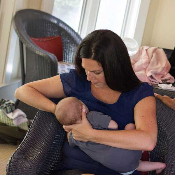 Mother holding her newborn