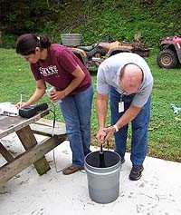 Ekta Choudhary, PhD (EIS ’09) collecting water samples in West Virginia