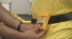 image of man with alarming dosimeter