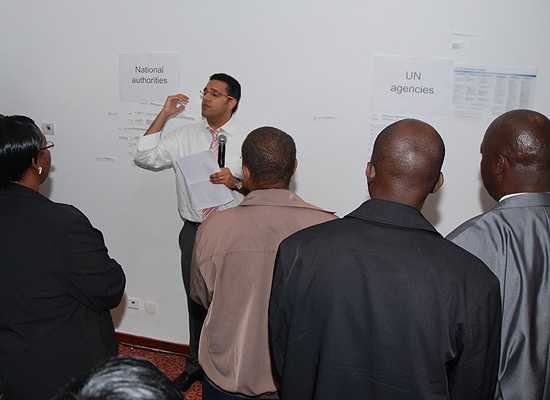 Altaf Sadrudin Musani, World Health Organization, working with group at training in Tunisia