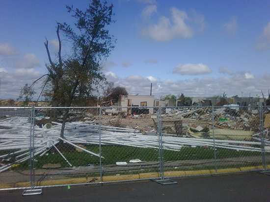 Local plumbing supply store demolished by tornado only a few blocks from the University of Alabama.