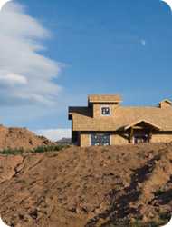 Construction of house on exposed soil