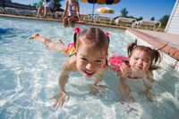 Photo: Two kids in pool