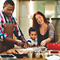 Image of family making cookies