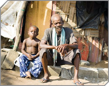 An image of a man and boy in south africa looking into the camera