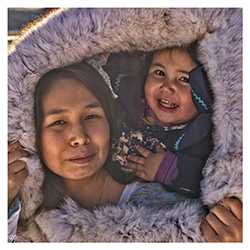 Mother and Daughter smiling