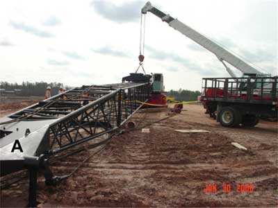 Peak of lattice boom after it had been lowered to the ground