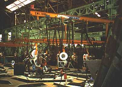 	Wire welding units on overhead Jib Booms