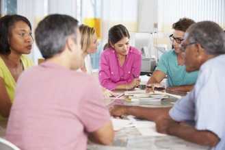 Group of people at a meeting.