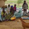 group of children sitting outside