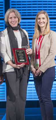 Left to right: Dr. Amy Sullivan, MCHD’s Director of Communicable Disease Services and Kelly Howard, PHAP associate, receive the NACCHO Model Practice award.