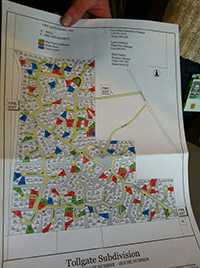 Tollgate residence map outlining each home and risk status.