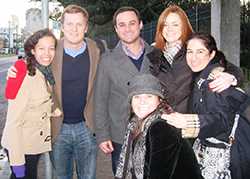 Evacuteer.org Program Contacts and the CDC site visit team pose beside a current Evacuation pick-up point in New Orleans (L. to R.) Courtni Blackstone, Robert Fogarty, & David Morris of evacuteer.org; Victoria Harp, Cori Wigington, & Robyn Sobelson of CDC.