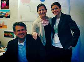 4/29/2013 – Daniel Homsey seated at his desk with the visitors from the CDC: Victoria Harp and Cori Wigington.