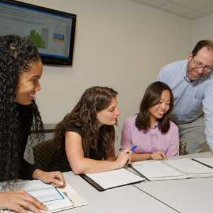 CDC microbiologists and epidemiologists review laboratory reports