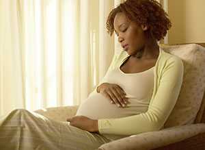 Pregnant woman sitting