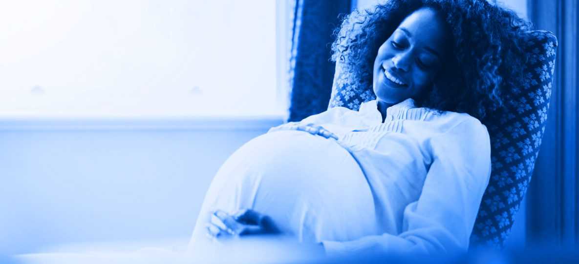 Pregnant woman smiling