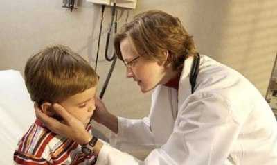 Child being examined by doctor