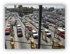 Cars crossing the United States-Mexico land border