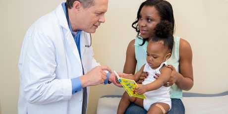 Mother and child with doctor.