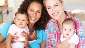 Two mothers sitting with their babies