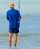 Fisherman in ocean